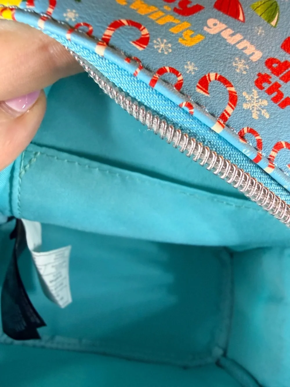 Loungefly “Elf-I Passed Through The 7 Levels Of The Candy Cane Forest” Backpack
